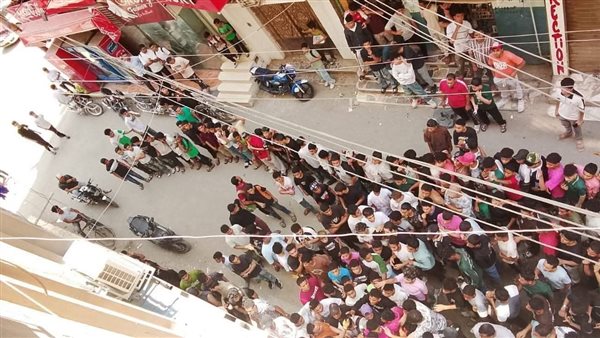 غلق محل ملابس بالأباصيري في بني سويف لتشغيله بدون ترخيص