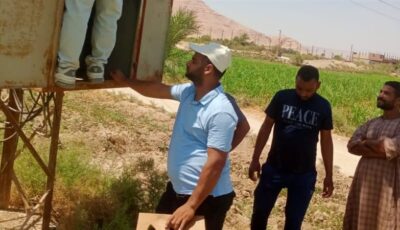لرفع كفاءة شبكة الكهرباء، تجديد محولات واستبدال 20 عمودًا في أبوحزام بنجع حمادي (صور)